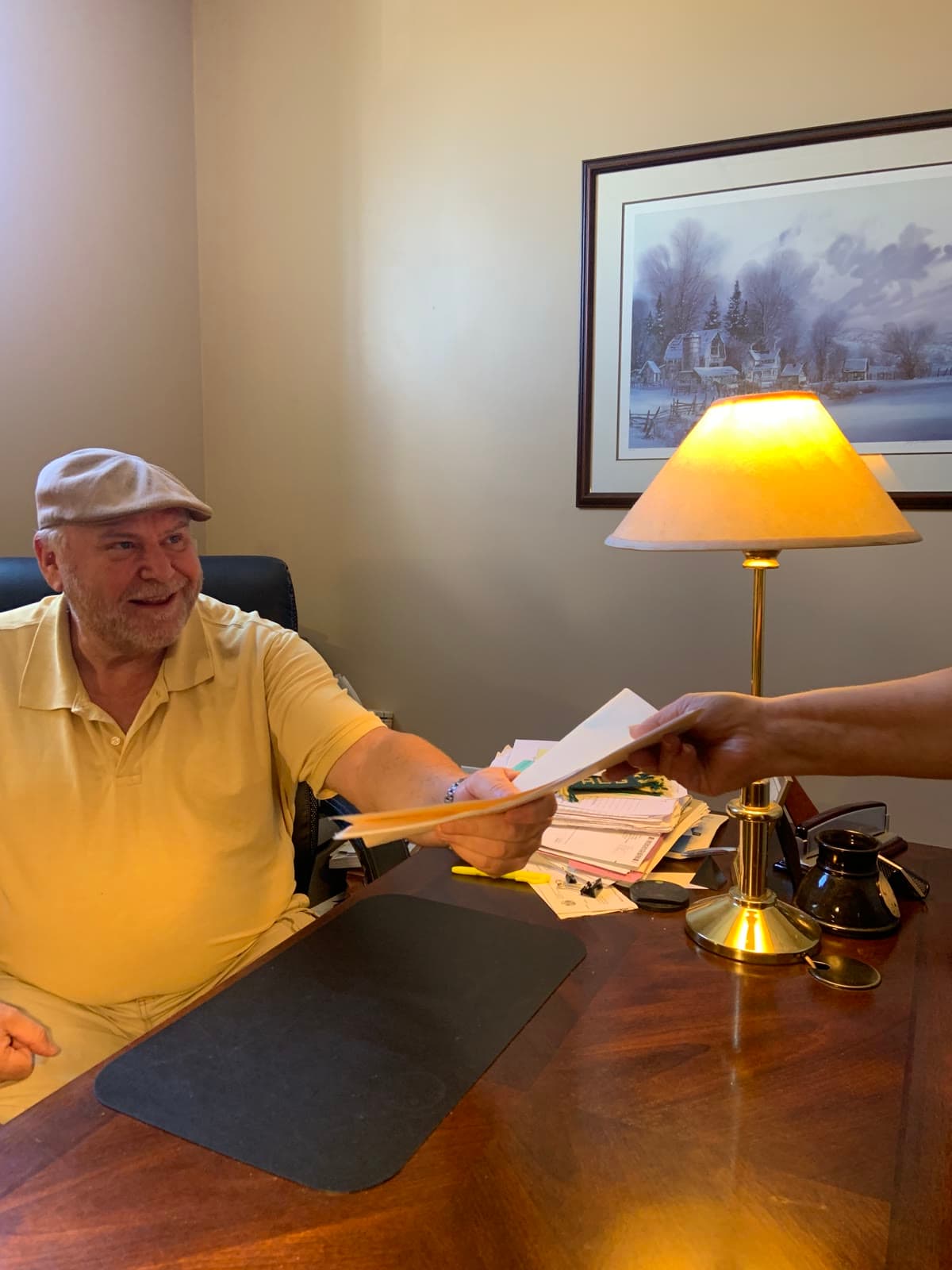 TJ Thorlackson at his desk reviewing a client return
